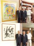 Prof Lawrence J LAU (first from left), Prof Wai-Yee CHAN (middle) and Prof Kenneth YOUNG (first from right) by the Thangka and the Calligraphy piece by TANG Shuangning, both donated to the College by Prof LAU